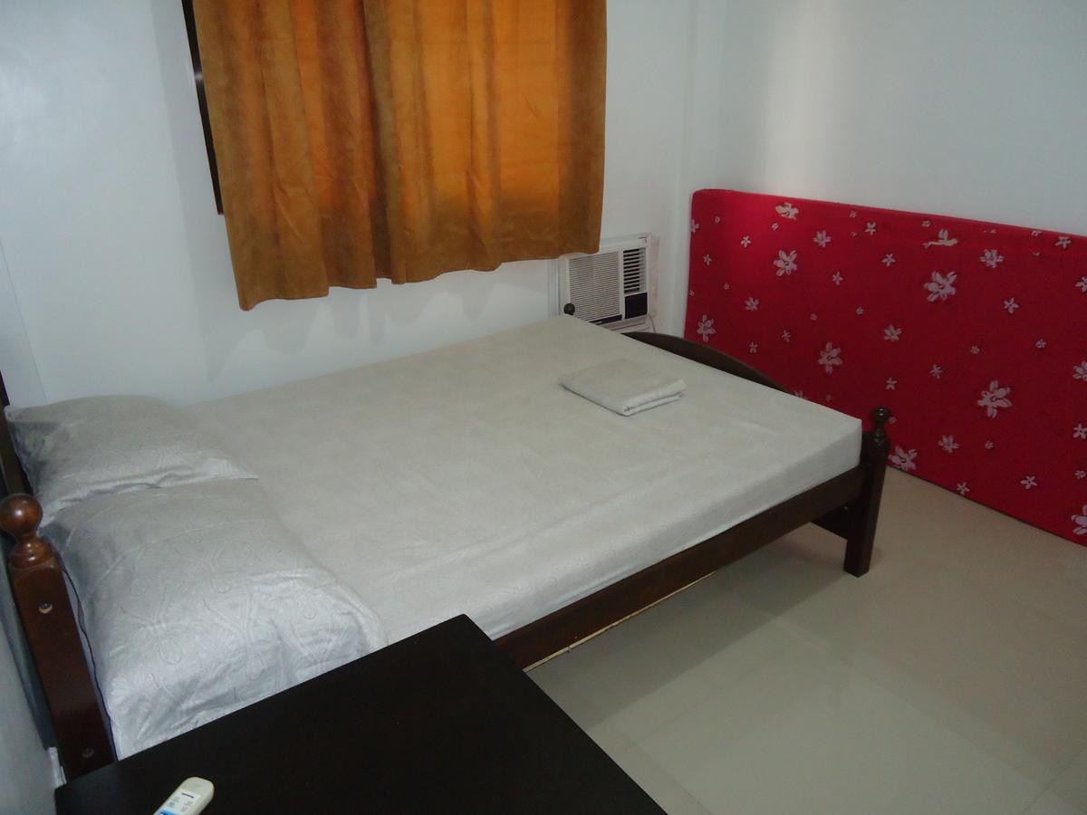 Rullan Apartelle Anda  Екстериор снимка