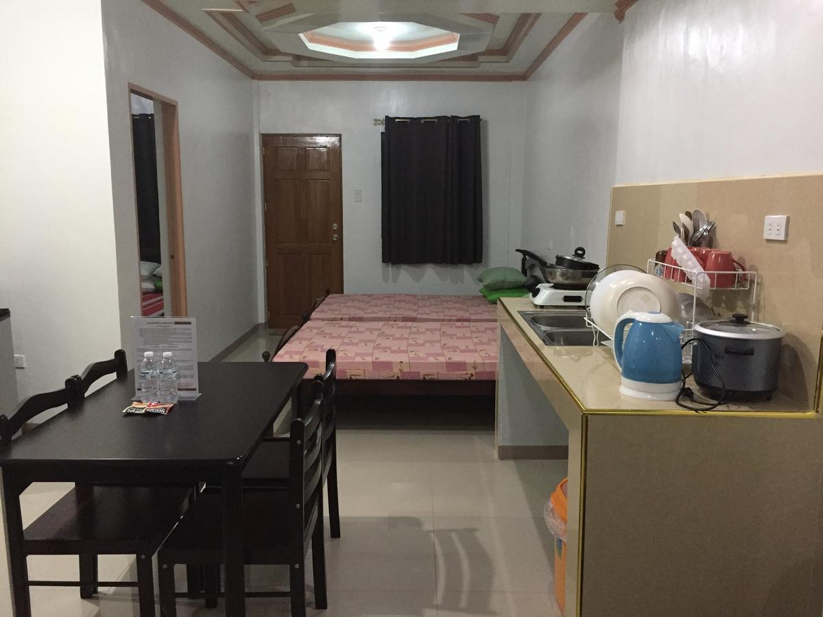 Rullan Apartelle Anda  Екстериор снимка